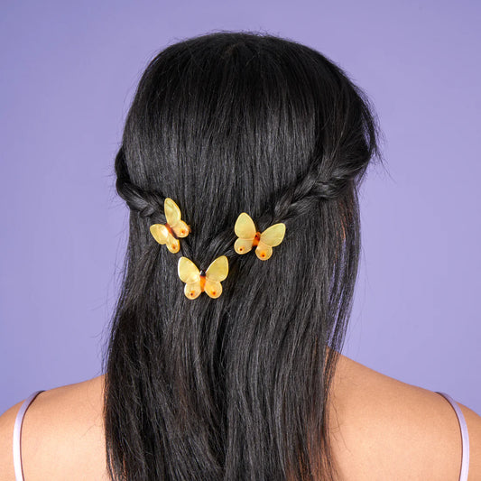 yellow butterfly hair clips in hair - coucou suzette